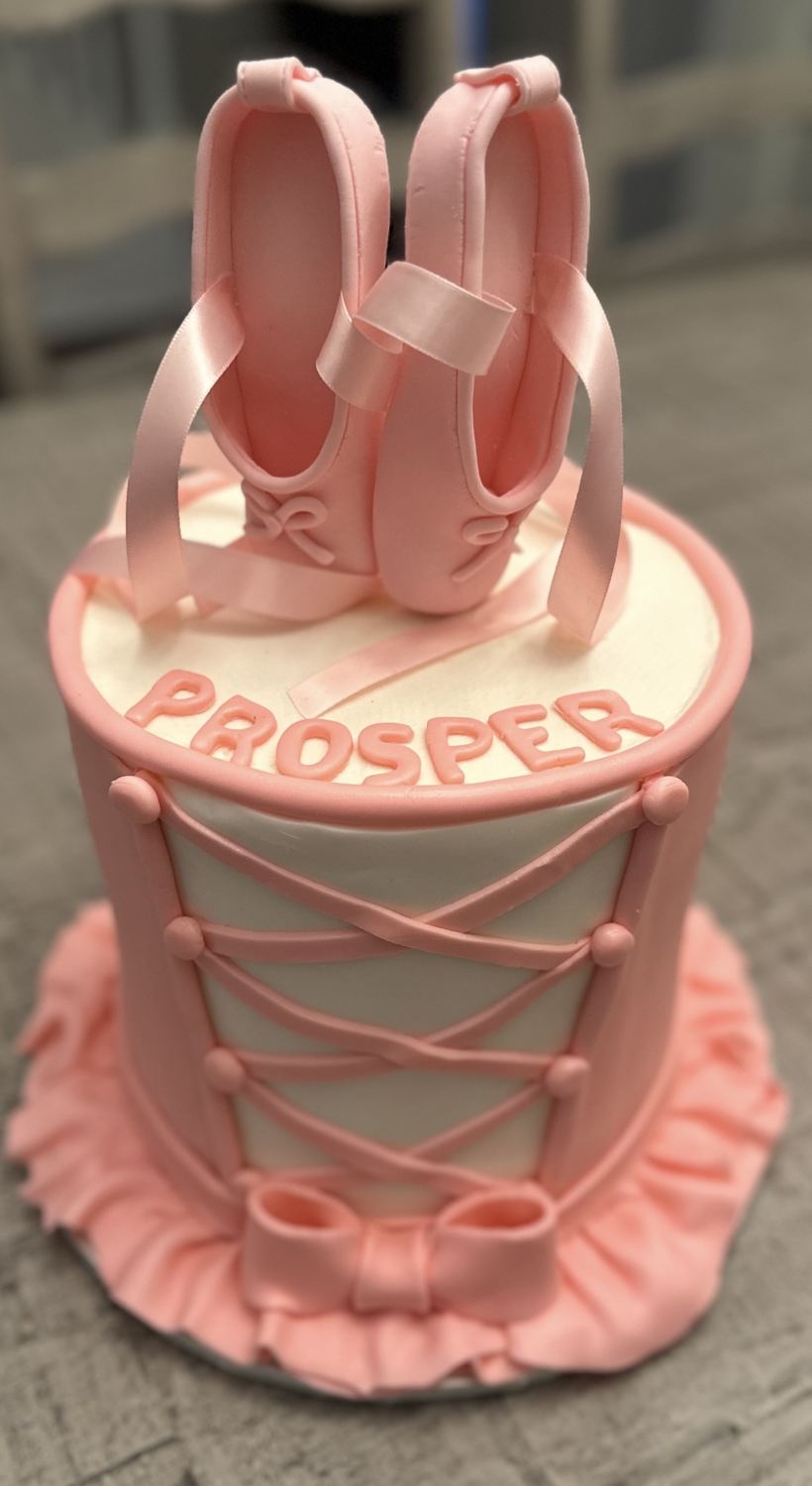 Detailed ballerina cake with pink fondant ballet slippers